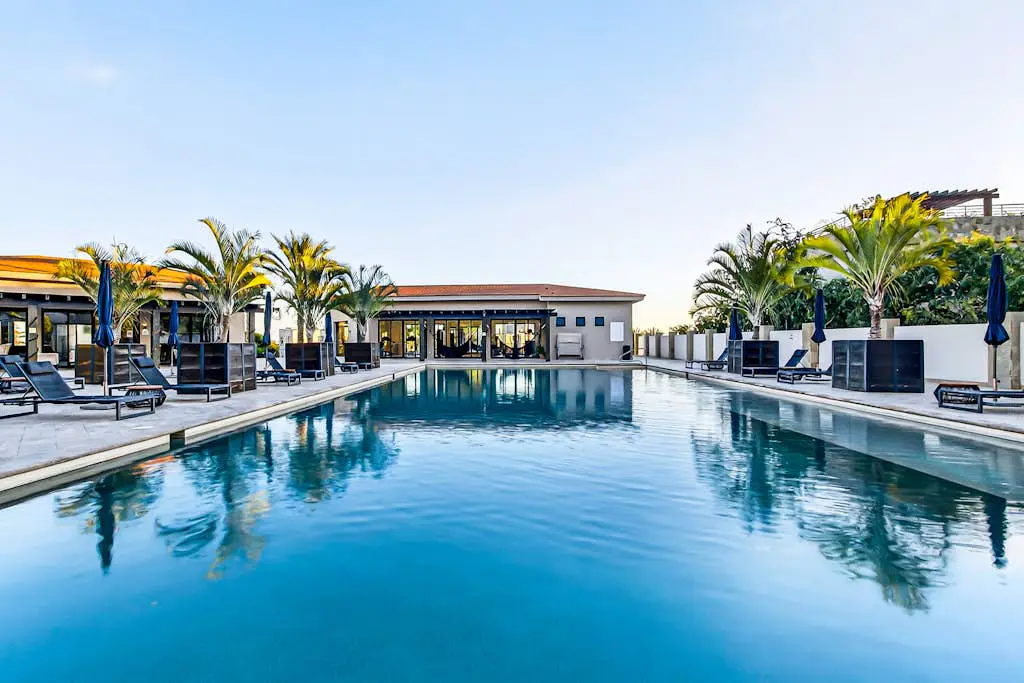 Modern apartment with. ocean view, pool, patio, tennis, & gym