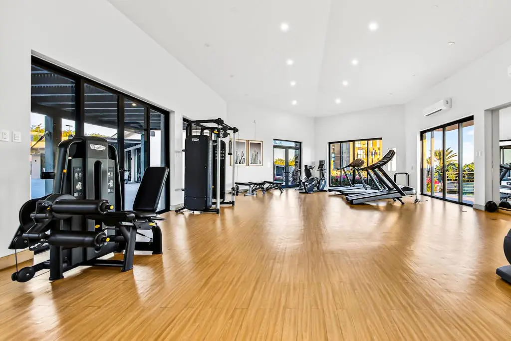 Modern apartment with. ocean view, pool, patio, tennis, & gym