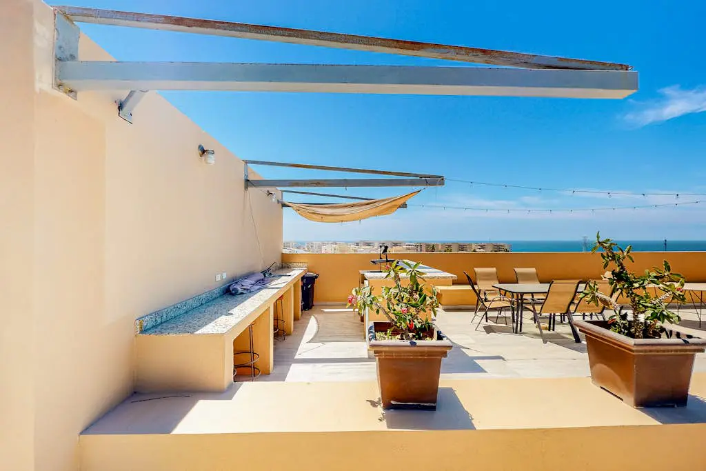 Luxurious mountain-view apartment close to the sea with rooftop sunset views