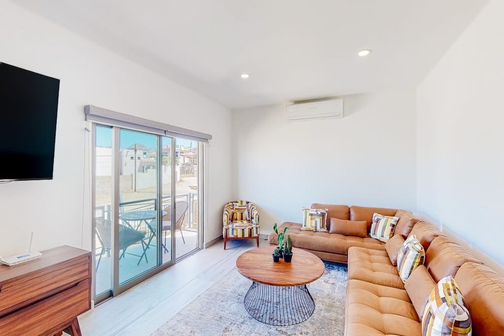 Luxurious mountain-view apartment close to the sea with rooftop sunset views