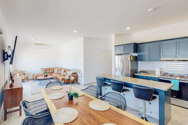 Luxurious mountain-view apartment close to the sea with rooftop sunset views