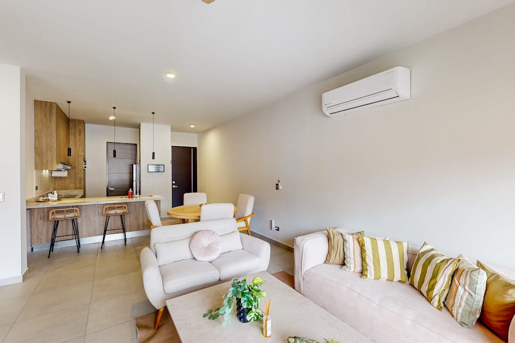 Gorgeous dog-friendly apartment with balcony, open layout, heated pool, & AC