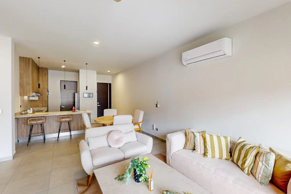 Gorgeous dog-friendly apartment with balcony, open layout, heated pool, & AC