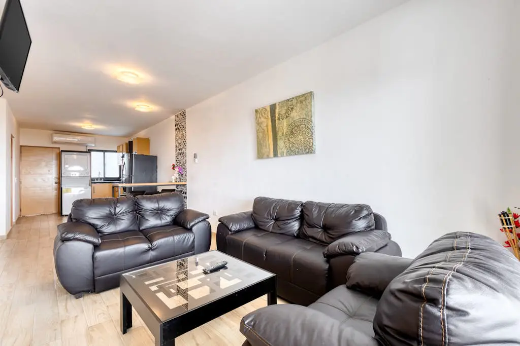 Ocean view condo with scenic balcony, well-equipped kitchen, internet, & W/D