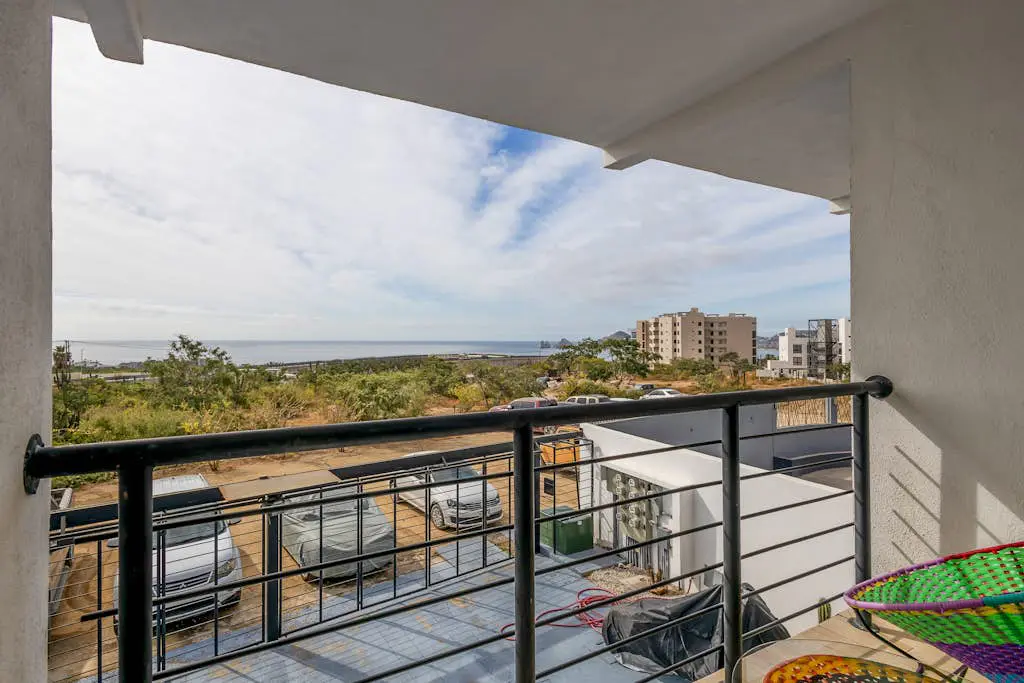 Ocean view condo with scenic balcony, well-equipped kitchen, internet, & W/D