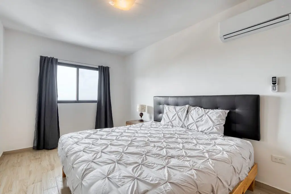 Ocean view condo with scenic balcony, well-equipped kitchen, internet, & W/D