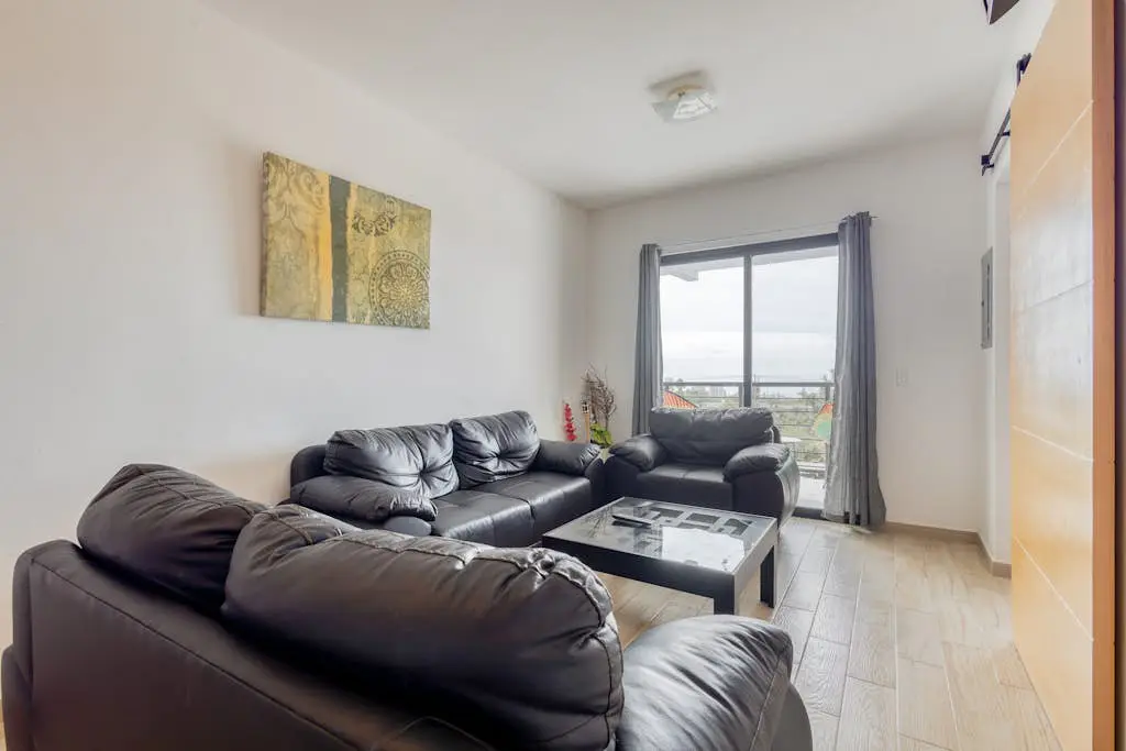 Ocean view condo with scenic balcony, well-equipped kitchen, internet, & W/D