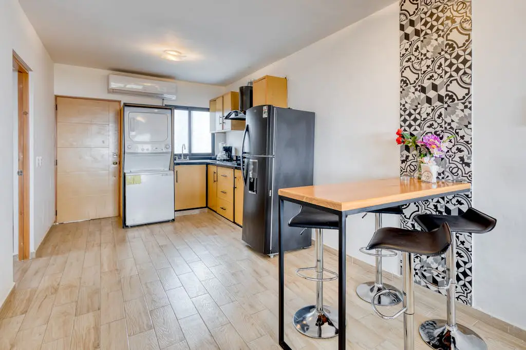Ocean view condo with scenic balcony, well-equipped kitchen, internet, & W/D