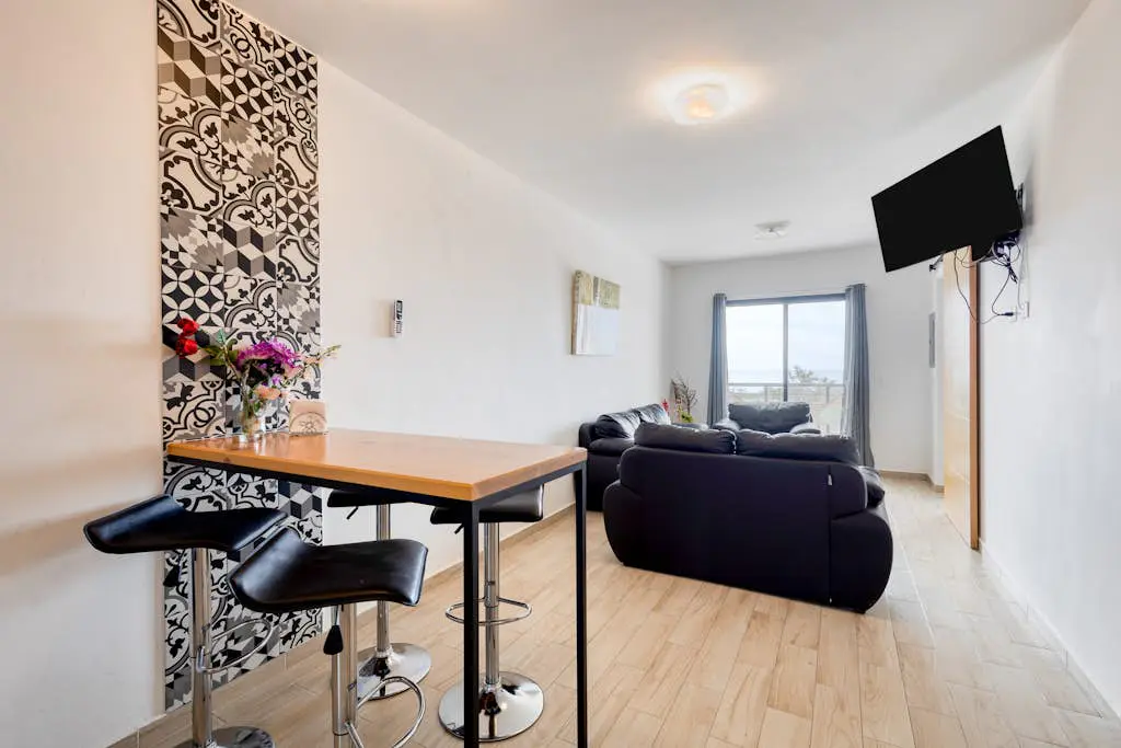 Ocean view condo with scenic balcony, well-equipped kitchen, internet, & W/D