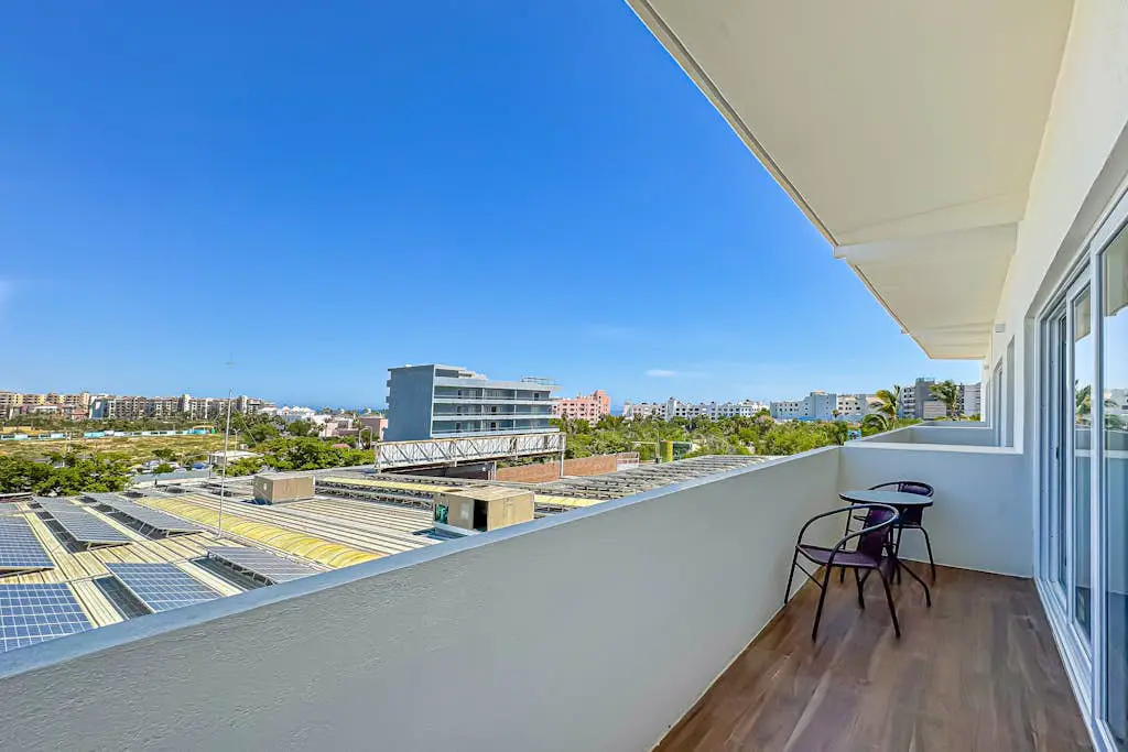 Luxury condo with shared gym, rooftop pool, and centrally located