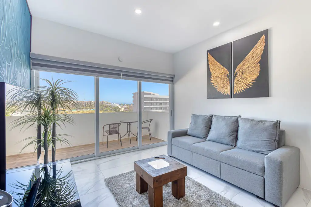 Luxury condo with shared gym, rooftop pool, and centrally located