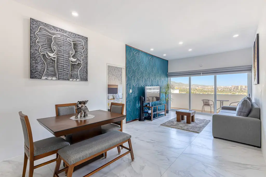 Luxury condo with shared gym, rooftop pool, and centrally located