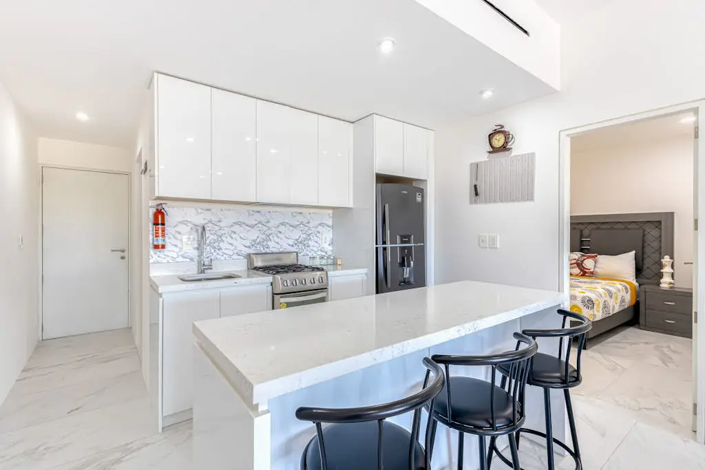 Luxury condo with shared gym, rooftop pool, and centrally located