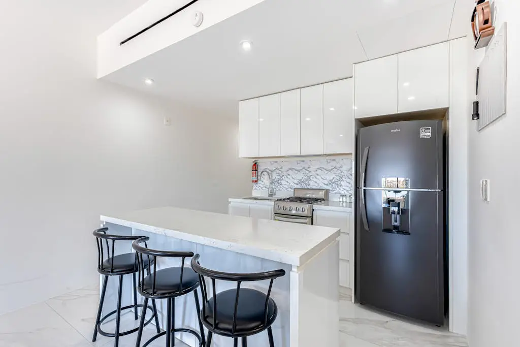 Luxury condo with shared gym, rooftop pool, and centrally located