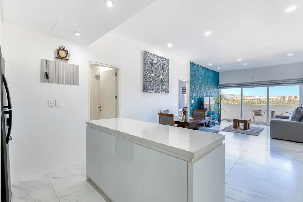 Luxury condo with shared gym, rooftop pool, and centrally located