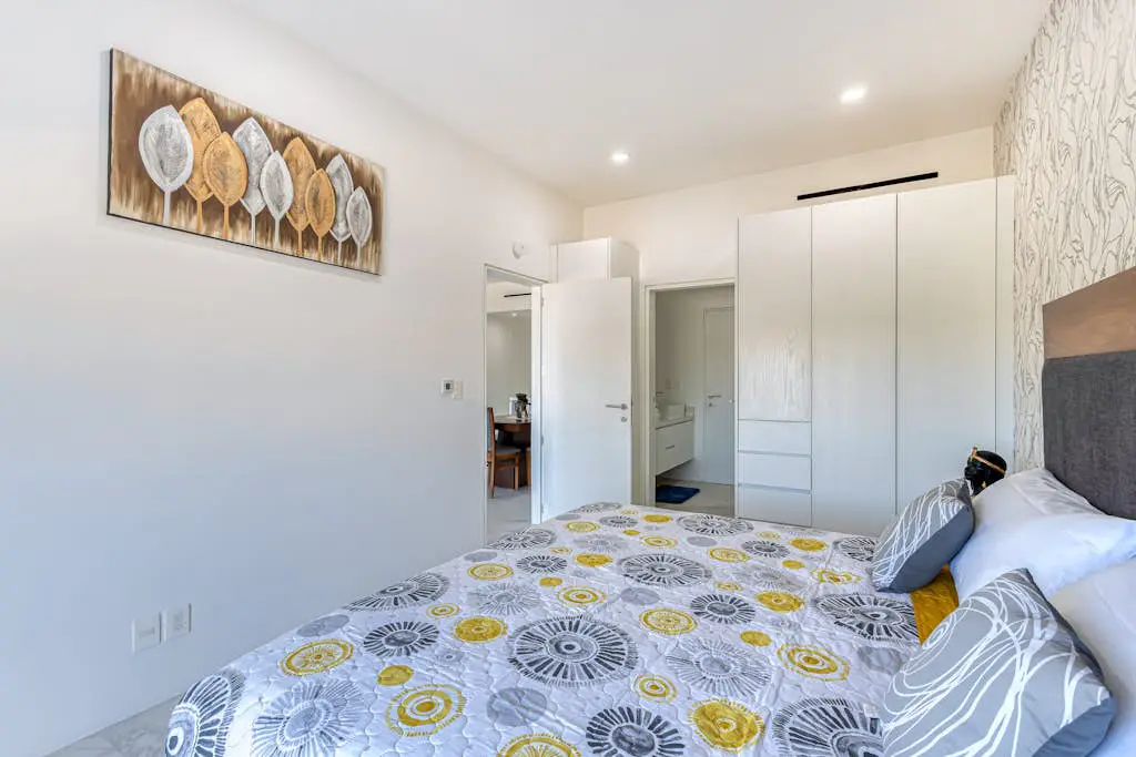 Luxury condo with shared gym, rooftop pool, and centrally located
