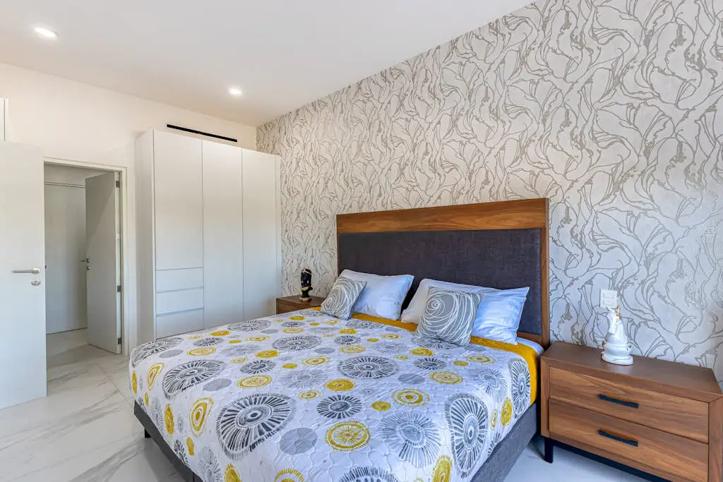 Luxury condo with shared gym, rooftop pool, and centrally located
