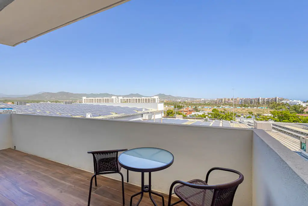 Luxury condo with shared gym, rooftop pool, and centrally located