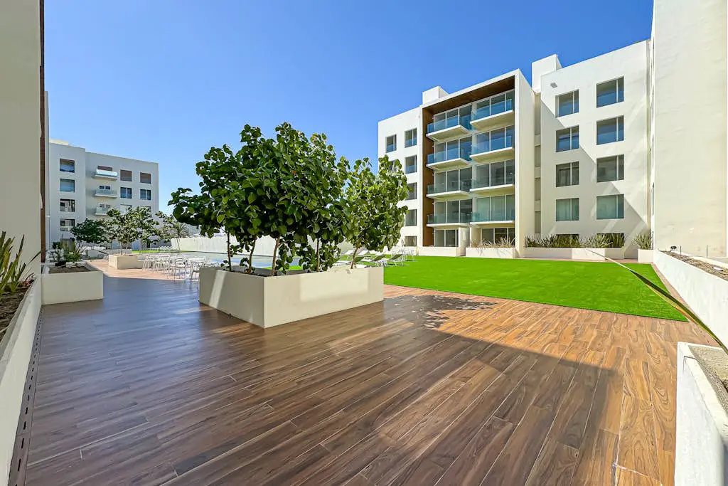 Luxury condo with shared gym, rooftop pool, and centrally located