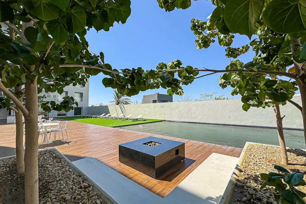 Luxury condo with shared gym, rooftop pool, and centrally located