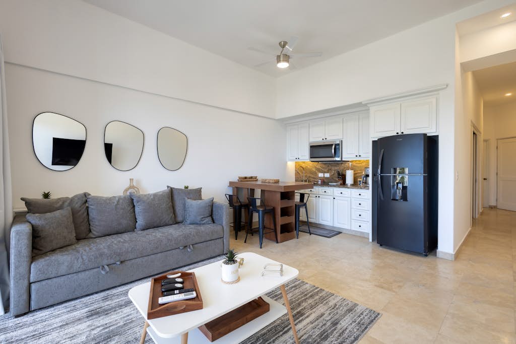 Stylish coastal retreat with breathtaking views, resort pool & private balcony