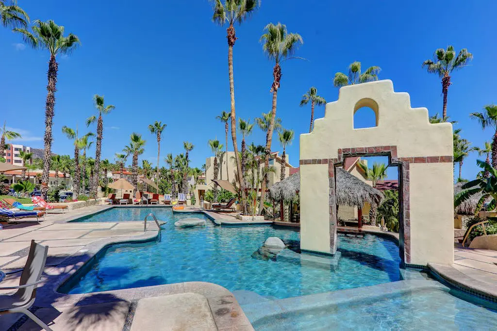 Stylish coastal retreat with breathtaking views, resort pool & private balcony