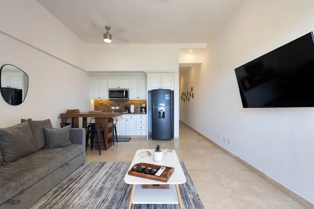Stylish coastal retreat with breathtaking views, resort pool & private balcony
