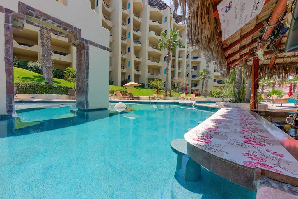 Stylish coastal retreat with breathtaking views, resort pool & private balcony