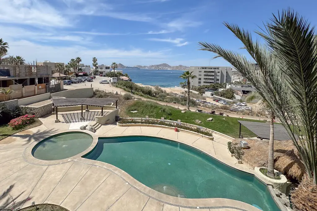 Stylish coastal retreat with breathtaking views, resort pool & private balcony