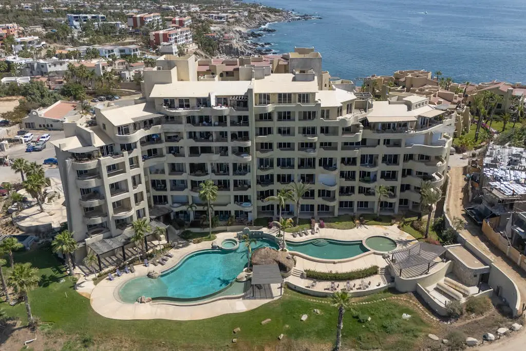 Stylish coastal retreat with breathtaking views, resort pool & private balcony
