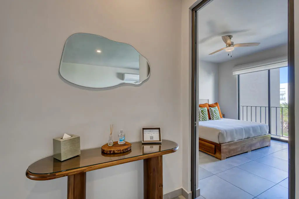 Bright and modern condo w/ balcony, shared pool, a/c, minutes to beach & town
