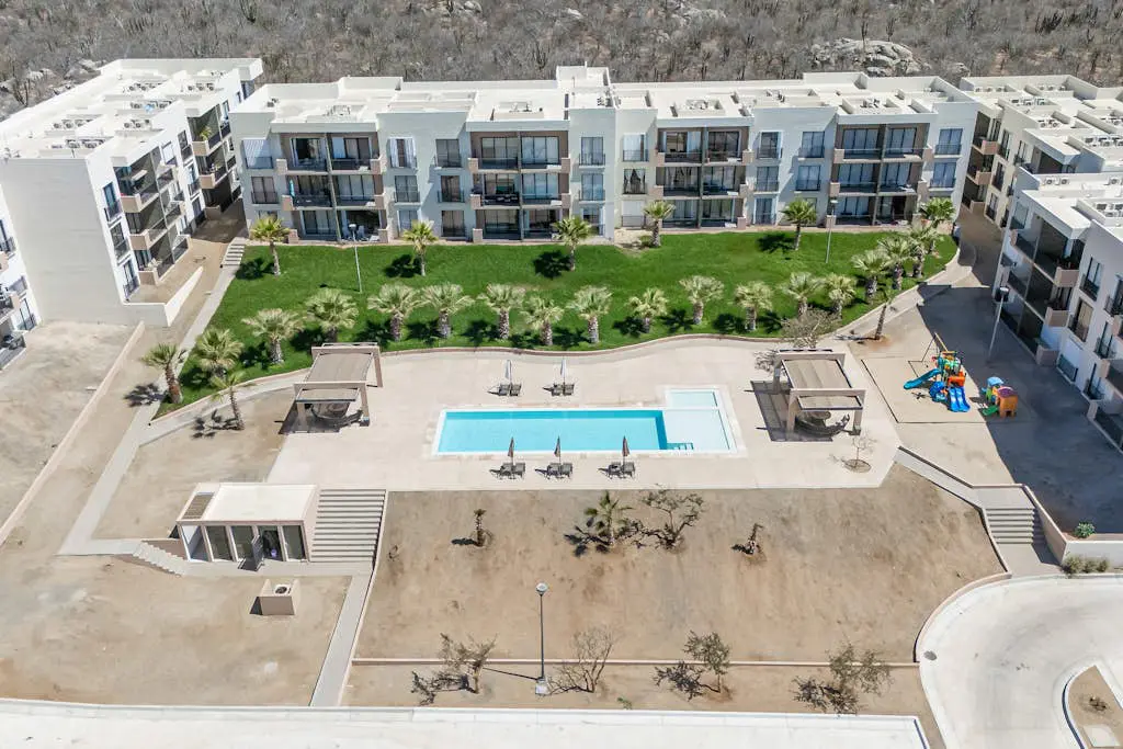 Bright and modern condo w/ balcony, shared pool, a/c, minutes to beach & town