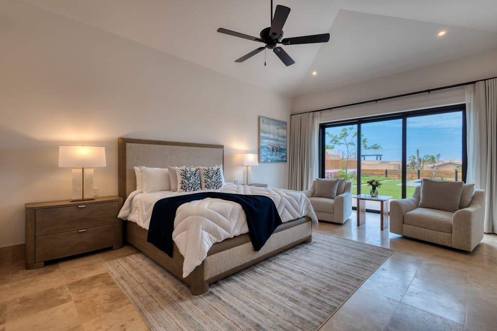 Experience comfort, space, and coastal views in this five-bedroom home located in Diamante Cabo San Lucas.
• 1 king-size bed, 6 queen beds, 2 double beds, and 6 single beds
• Private pool, rooftop, and outdoor dining area with golf course views
• One of the largest saltwater pool in Latin America
• Access to world-class golf courses: The Dunes Course and El Cardonal
• Spacious indoor living area with fully equipped kitchen and lounge spaces
• Fire pit and patio
• Kids club, spa & fitness center