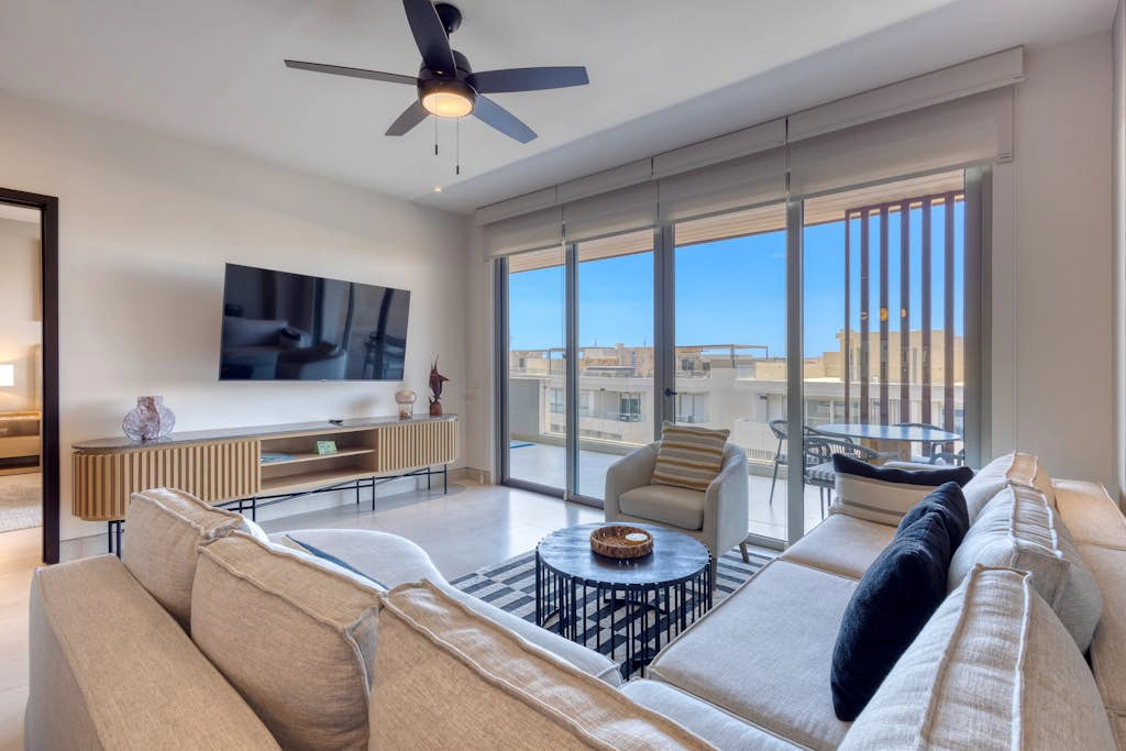 Elegant resort condo with heated pool, pickleball, gym & garden views