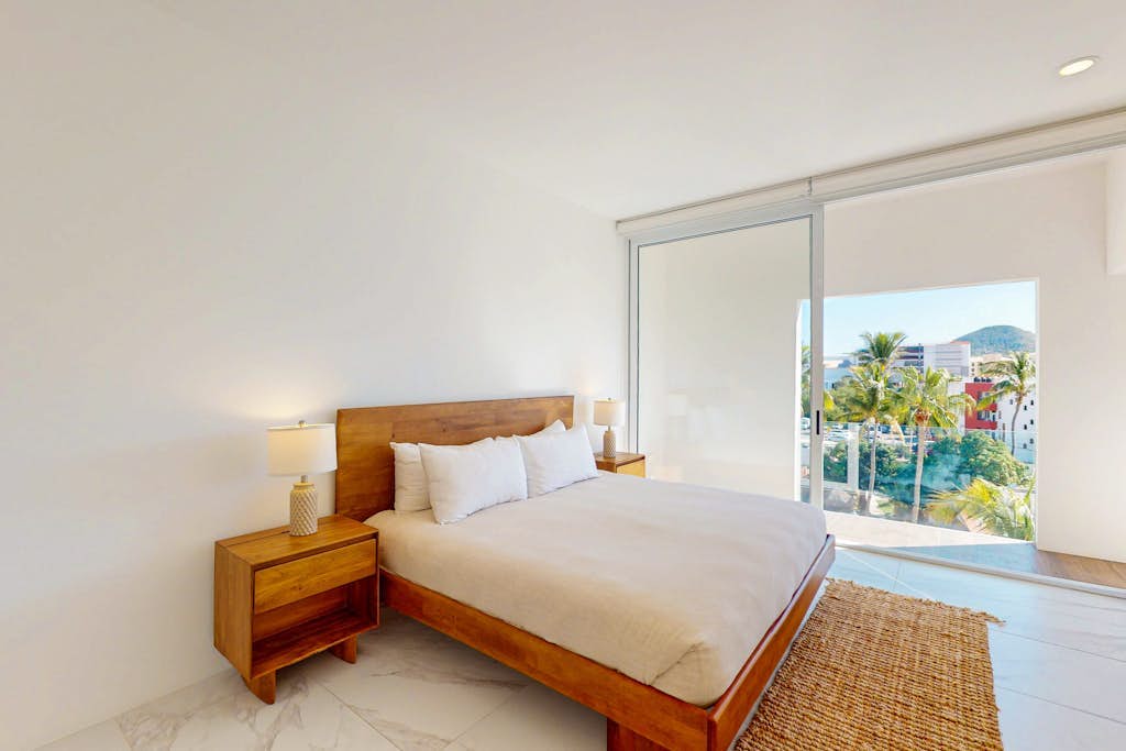 Experience the perfect blend of comfort and coastal luxury in our two-bedroom apartment at Marea Los Cabos.
• One king-size bed and two single beds
• Single-level layout for accessibility
• Private balcony with seating and Nespresso coffee machine
• Fully equipped kitchen, smart TV, and Netflix
• Access to a swimming pool and gym
• Quiet, serene setting just minutes from Cabo's beaches, marina, and nightlife
• Available washer and dryer
• 24/7 security