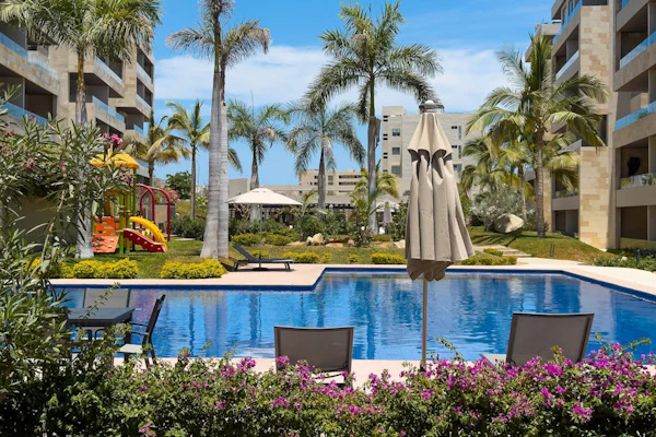 Luxury Cabo condo with multiple pools, pickleball, gym & rooftop