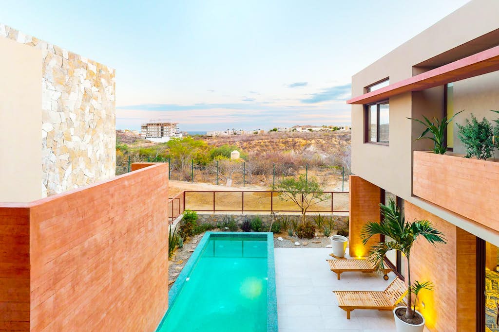 Luxury house with private pool, ocean view, inviting balcony & elegant charm