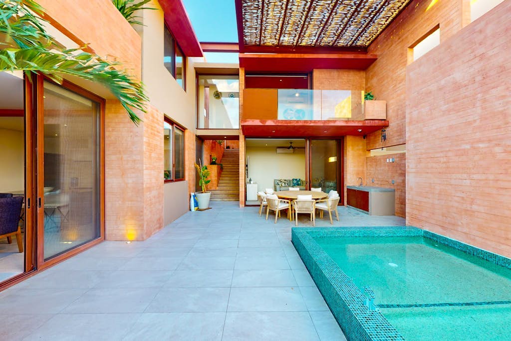 Luxury house with private pool, ocean view, inviting balcony & elegant charm