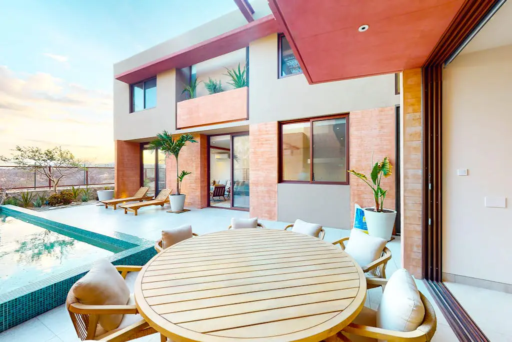 Luxury house with private pool, ocean view, inviting balcony & elegant charm