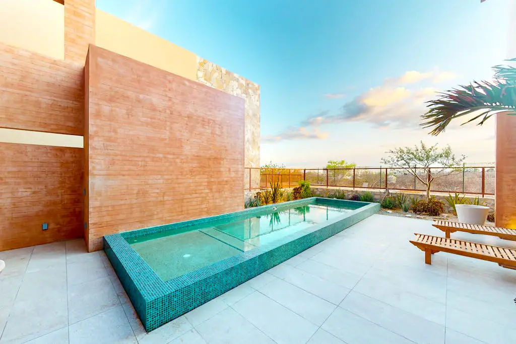 Luxury house with private pool, ocean view, inviting balcony & elegant charm