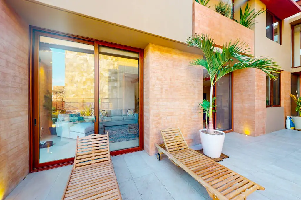 Luxury house with private pool, ocean view, inviting balcony & elegant charm