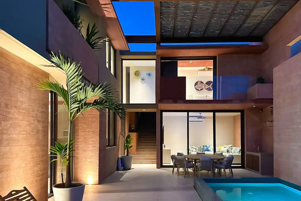 Luxury house with private pool, ocean view, inviting balcony & elegant charm
