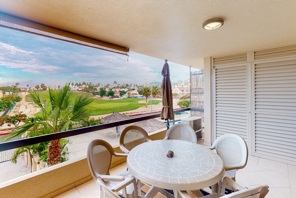 Inviting apartment across from the beach with pool, grill, balcony & golf nearby