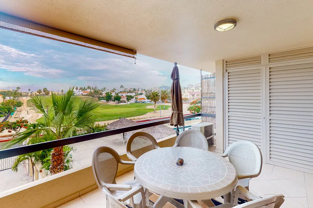 Inviting apartment across from the beach with pool, grill, balcony & golf nearby