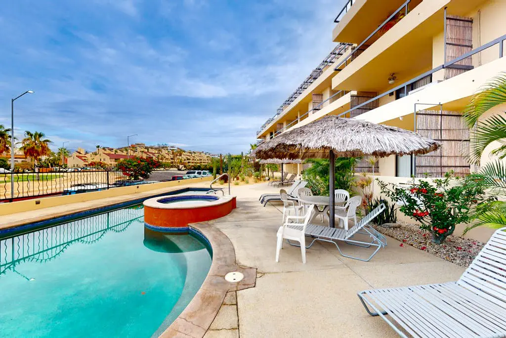 Inviting apartment across from the beach with pool, grill, balcony & golf nearby