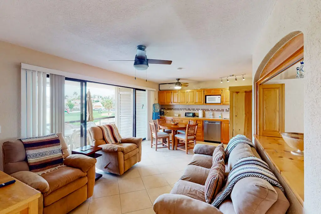 Inviting apartment across from the beach with pool, grill, balcony & golf nearby