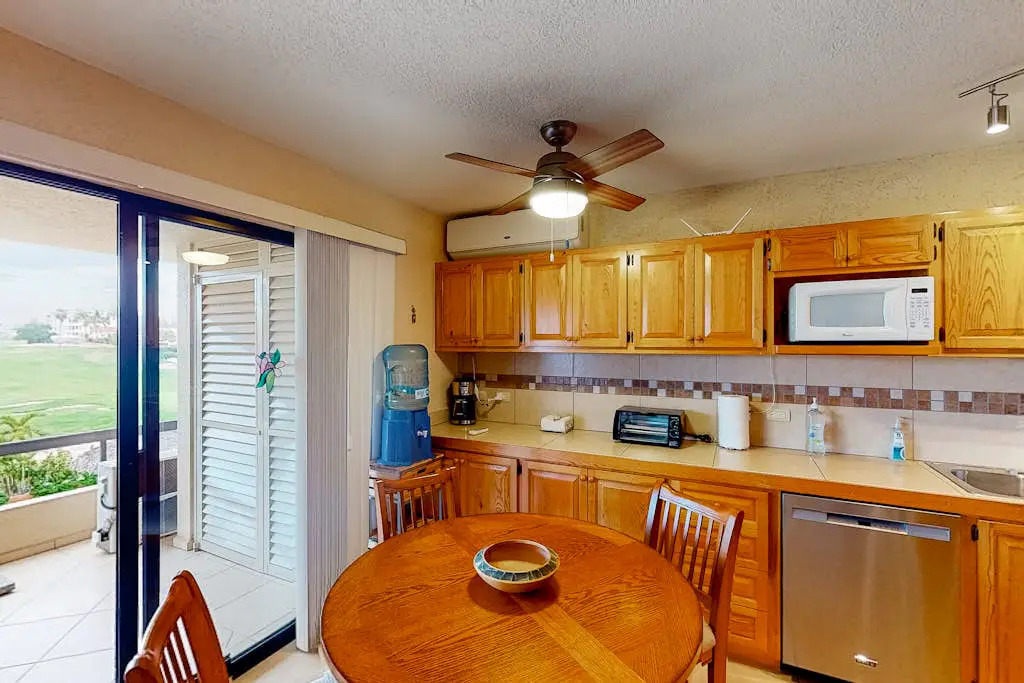 Inviting apartment across from the beach with pool, grill, balcony & golf nearby