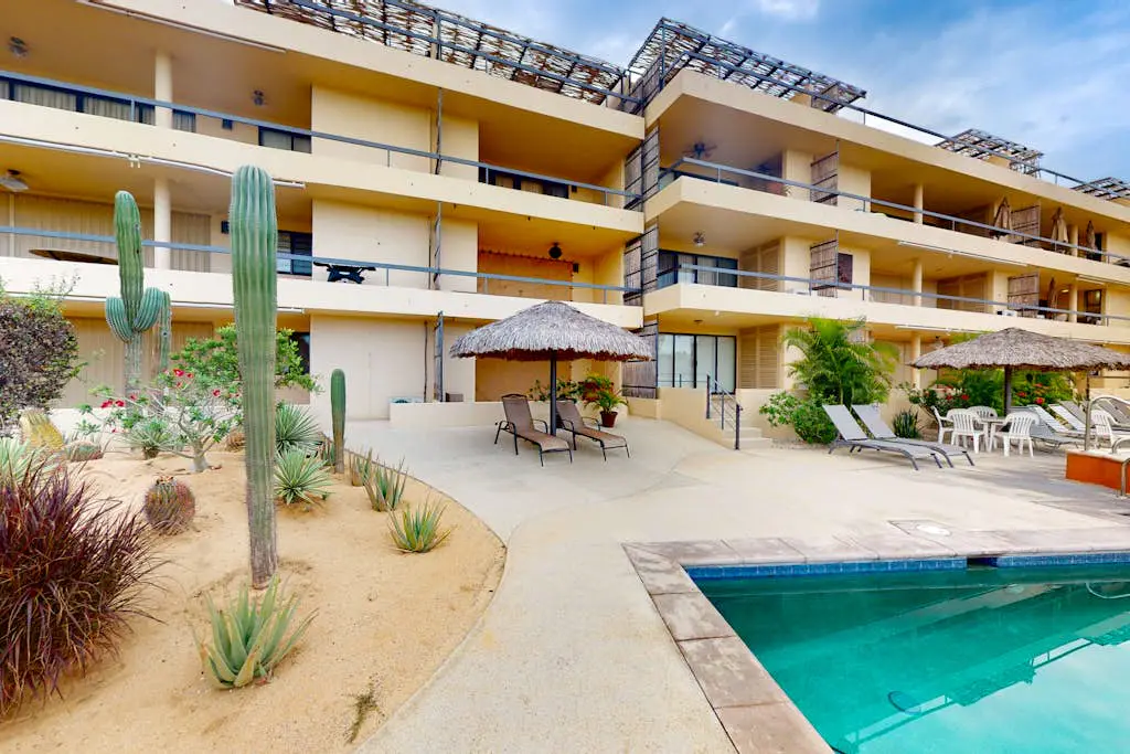 Inviting apartment across from the beach with pool, grill, balcony & golf nearby