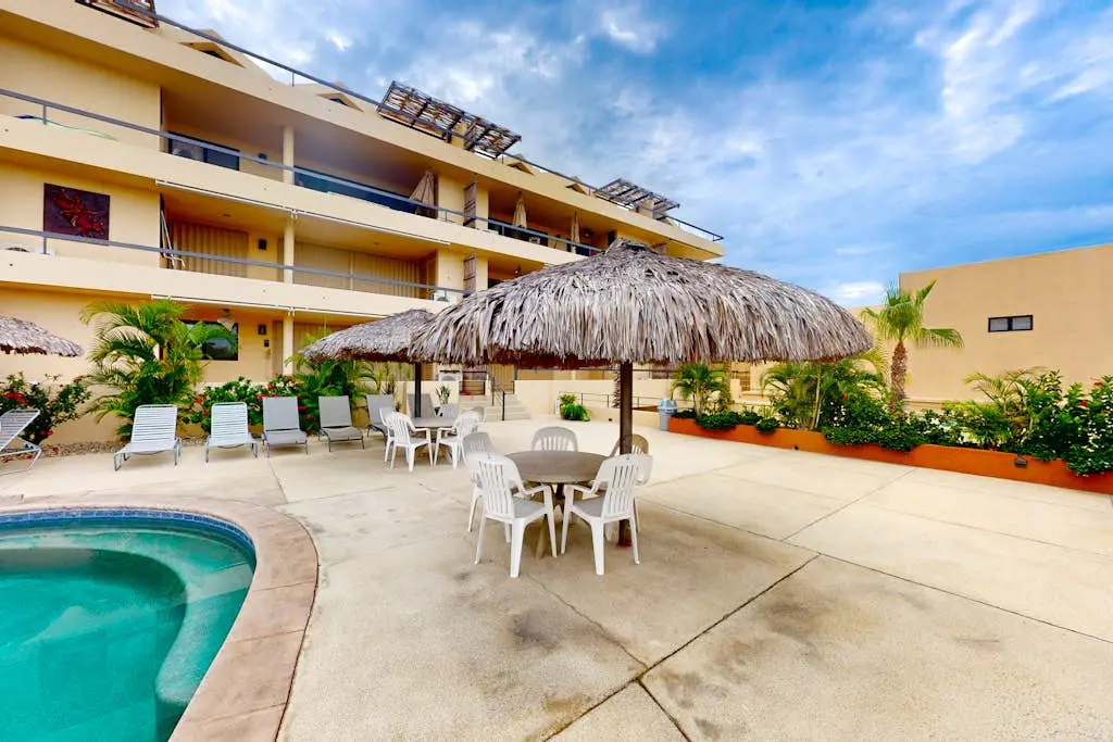 Inviting apartment across from the beach with pool, grill, balcony & golf nearby