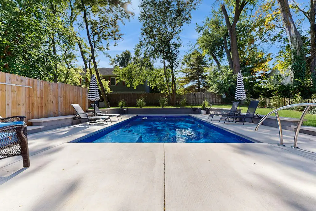 Merchant Street Pool Retreat with a  Year-Round Hot Tub.